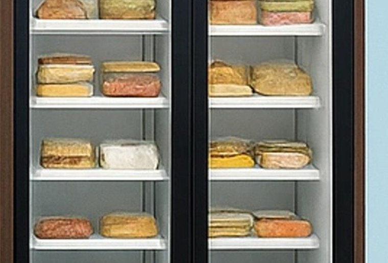 A cooler case stocked with fresh food items